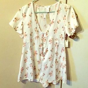 Small floral jumper hasn’t been worn